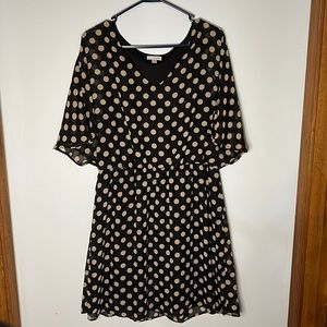 Charming Charlie v-neck dress with loose sleeves, elastic waist and black liner.